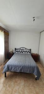 Ένα ή περισσότερα κρεβάτια σε δωμάτιο στο Casa Martina