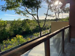 a view from the balcony of a house at Casa de Praia Itacimirim Bahia - Piscina e Conforto in Camacari