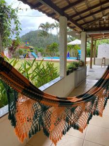 Bazén v ubytování Casa de Campo Chácara Recanto da Águia nebo v jeho okolí