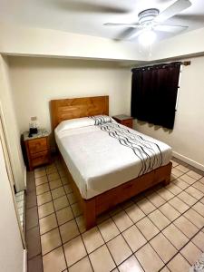 Postel nebo postele na pokoji v ubytování Hotel León