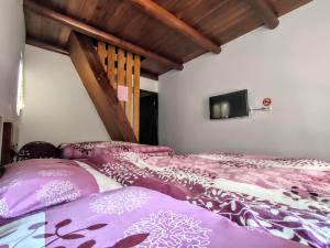 Postel nebo postele na pokoji v ubytování Lieyu B&B