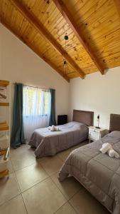 Ένα ή περισσότερα κρεβάτια σε δωμάτιο στο Habitación privada en casa compartida - Complejo Aime - Ruka
