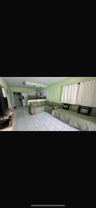 a living room with a couch and a table at Canto Feliz in Prado