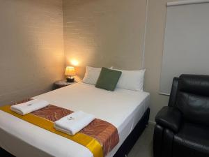Postel nebo postele na pokoji v ubytování Kalua Motel
