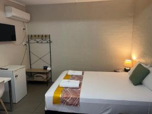 Postel nebo postele na pokoji v ubytování Kalua Motel