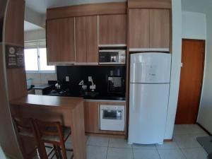 Η κουζίνα ή μικρή κουζίνα στο Apartamento Completo 2 Quartos