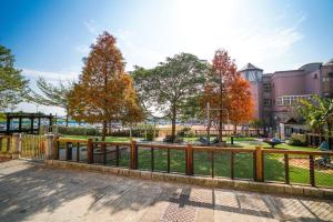 a park with a playground and a swing at 金華民宿 in Jincheng