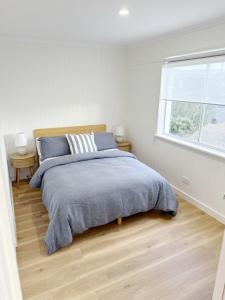 Magpie Sands - Coastal Escape & Wine Country - Beachside Getaway客房内的一张或多张床位