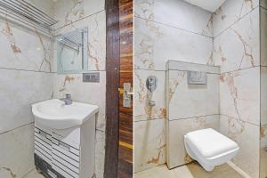 Koupelna v ubytování Townhouse Bhavya Residency