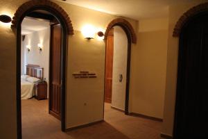 Postel nebo postele na pokoji v ubytování Hotel Casa Beletri