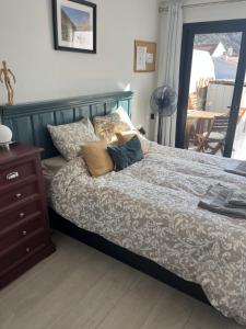 A bed or beds in a room at Sea View Penthouse with Large Terrace