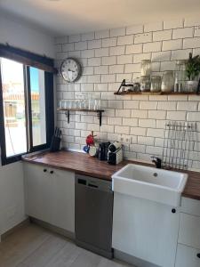 A kitchen or kitchenette at Sea View Penthouse with Large Terrace