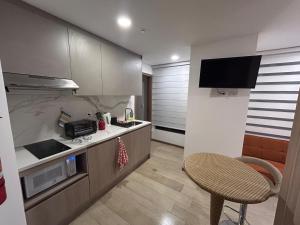 Köök või kööginurk majutusasutuses Mini suite cerca del parque La Carolina Quito