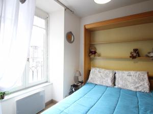 Posteľ alebo postele v izbe v ubytovaní Appartement F1 bis en hyper-centre du Mont-Dore avec ascenseur - FR-1-415-144