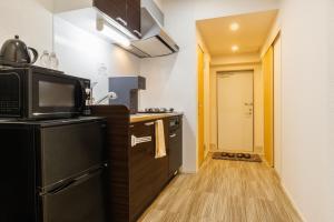 Eldhús eða eldhúskrókur á だるまマンション903