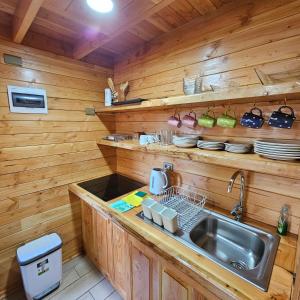 Kuchyň nebo kuchyňský kout v ubytování Cabaña Los Alerces
