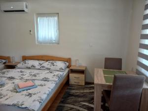Katil atau katil-katil dalam bilik di Apartman KONAK