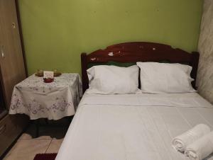 Katil atau katil-katil dalam bilik di Quarto do descanso e da alegria +1 gambar