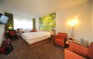 TV a/nebo společenská místnost v ubytování Hotel Ratskeller