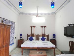 Letto o letti in una camera di Sneh Deep Guest House