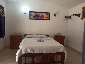 Postel nebo postele na pokoji v ubytování Zappia Cove Resort Palolem