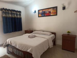 Postel nebo postele na pokoji v ubytování Zappia Cove Resort Palolem