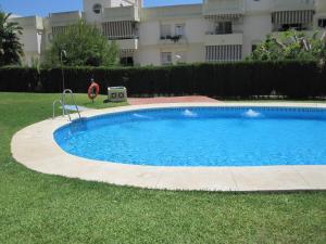 Bazén v ubytovaní Fan Flat Torremolinos alebo v jeho blízkosti