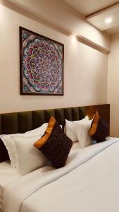 Giường trong phòng chung tại Soil to Soul Trinity Hotel - A Boutique Stay