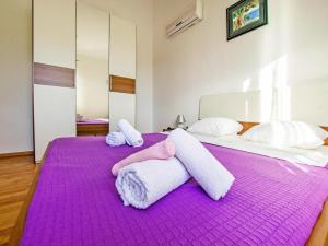 Postel nebo postele na pokoji v ubytování Apartment in Seline near Paklenica Park