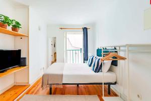 Μια τηλεόραση ή/και κέντρο ψυχαγωγίας στο Alfama Comfy Studio