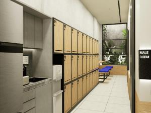 a locker room with a row of lockers at Volbs in Tanah Lot