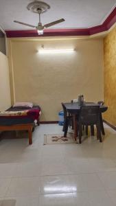 Ένα ή περισσότερα κρεβάτια σε δωμάτιο στο Durga Niwas