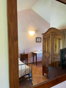 TV a/nebo společenská místnost v ubytování Albergo Cosmera