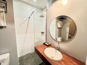 Koupelna v ubytování Grand Kangen Hotel Urip Sumoharjo
