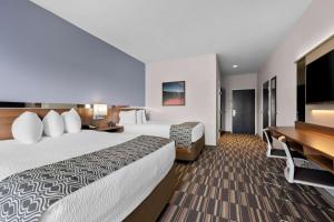 Postel nebo postele na pokoji v ubytování Microtel Inn & Suites by Wyndham Sweetwater
