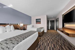 Postel nebo postele na pokoji v ubytování Microtel Inn & Suites by Wyndham Sweetwater