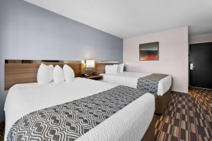 Postel nebo postele na pokoji v ubytování Microtel Inn & Suites by Wyndham Sweetwater