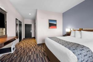 Postel nebo postele na pokoji v ubytování Microtel Inn & Suites by Wyndham Sweetwater