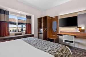 Postel nebo postele na pokoji v ubytování Microtel Inn & Suites by Wyndham Sweetwater