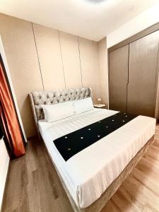 Postel nebo postele na pokoji v ubytování Agile TRX Luxury suite Bukit bintang