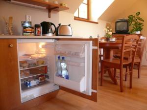 Kuchyňa alebo kuchynka v ubytovaní Pension a Restaurace Vyhlídka