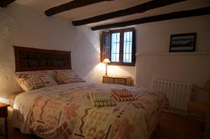 A bed or beds in a room at Casa Josefa