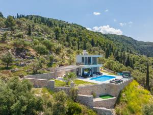 an aerial view of a house with a swimming pool at Zenvillas in Lefkada