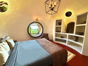 Postel nebo postele na pokoji v ubytování Dome Villas by Jade - Red Dome