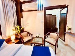 Postel nebo postele na pokoji v ubytování Hotel Ramawati - A unit of Standard Wedding and Party Maker, Haridwar