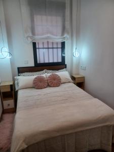 En eller flere senge i et værelse på El Paseo a Madrid 169 - Junto a la Casa de Campo + 35 billeder