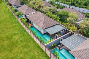 Ein Garten an der Unterkunft Javana Royal Villas