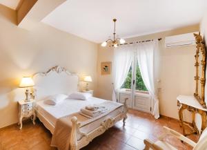 Posteľ alebo postele v izbe v ubytovaní Villa Galini + 37 fotografií