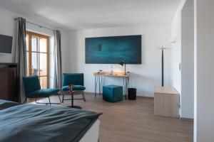 TV a/nebo společenská místnost v ubytování Nebelhorn Relaxhotel