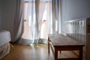 Posteľ alebo postele v izbe v ubytovaní La casita de Real de Cartuja - Apartamento Deluxe opción parking